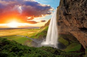 Seljalandsfoss is one of the most beautiful waterfalls on the Iceland. It is located on the South of the island. With a rainbow.